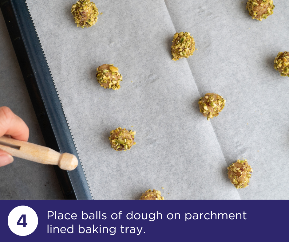 Place Cookies on a parchment lined baking tray | Pistachio Cherry Charmers Recipe