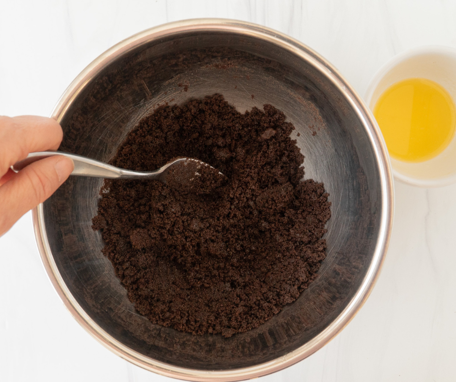 Add Melted Butter to Cookie Crumbs