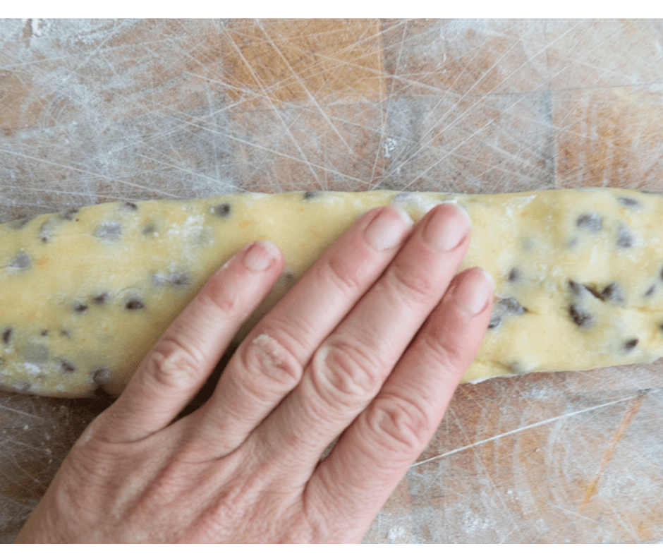 PAT DOUGH Pat dough until it is slightly flattened on top.