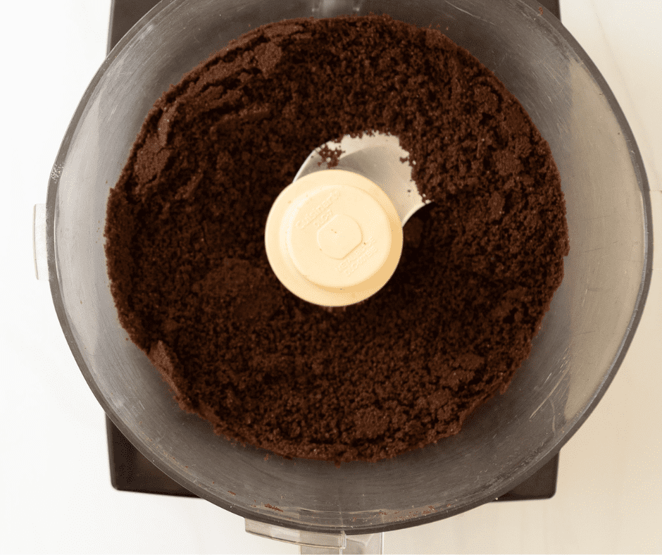 Crushed Chocolate Wafers Crushed chocolate cookie crumbs in a food processor