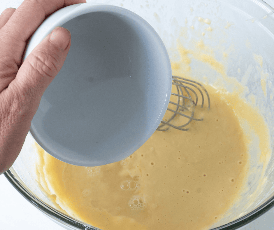 Pouring water in batter for Scrippelle