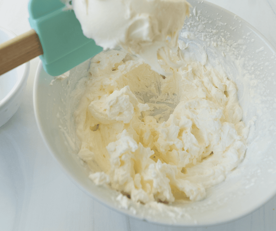 Folding Marscapone in with cream and vanilla 