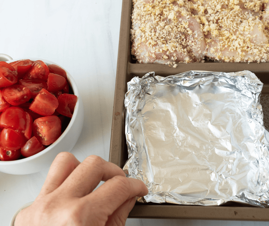 Making an aluminum foil bowl to hold the roasted tomatoes.