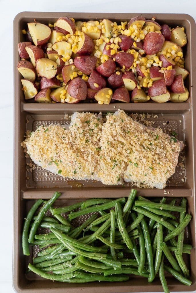 Beans, Fish and Potatoes and Corn in divided tray.