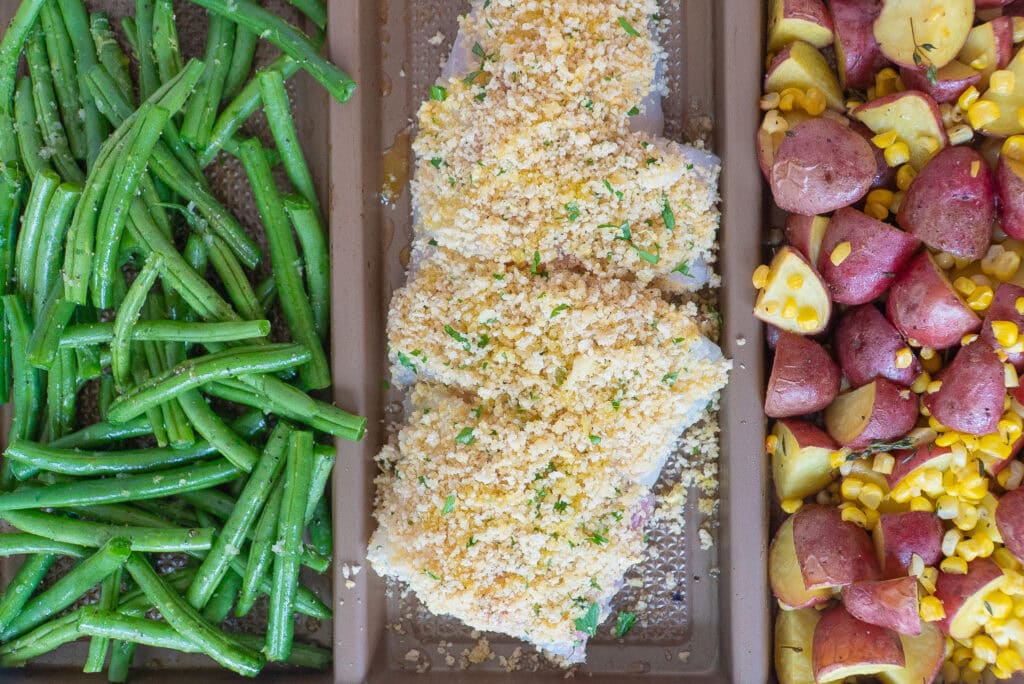 Beans, Fish and Potatoes and Corn in divided tray. 
