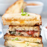 Stack of grilled cheese sandwiches
