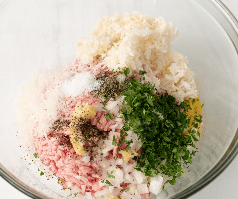 Ingredients in a bowl to make meat filling for stuffed cabbage recipe.