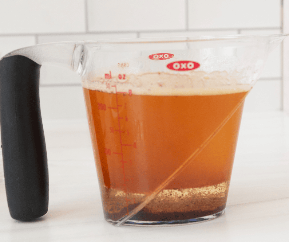 measuring cup with melted brown butter 