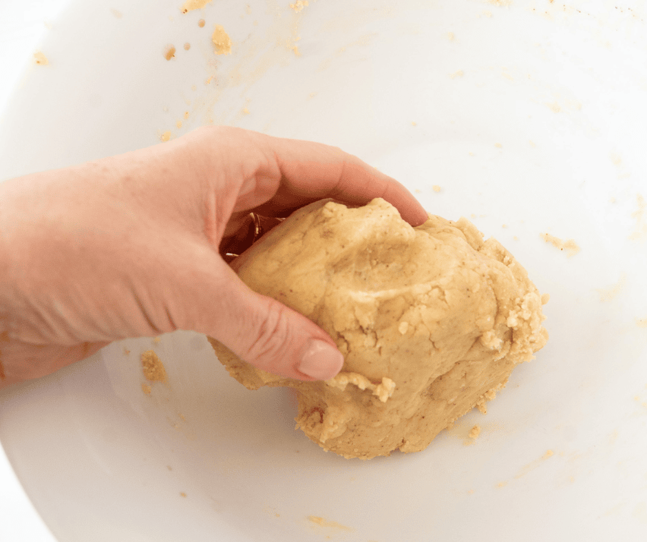 Hand shaping dough into a ball